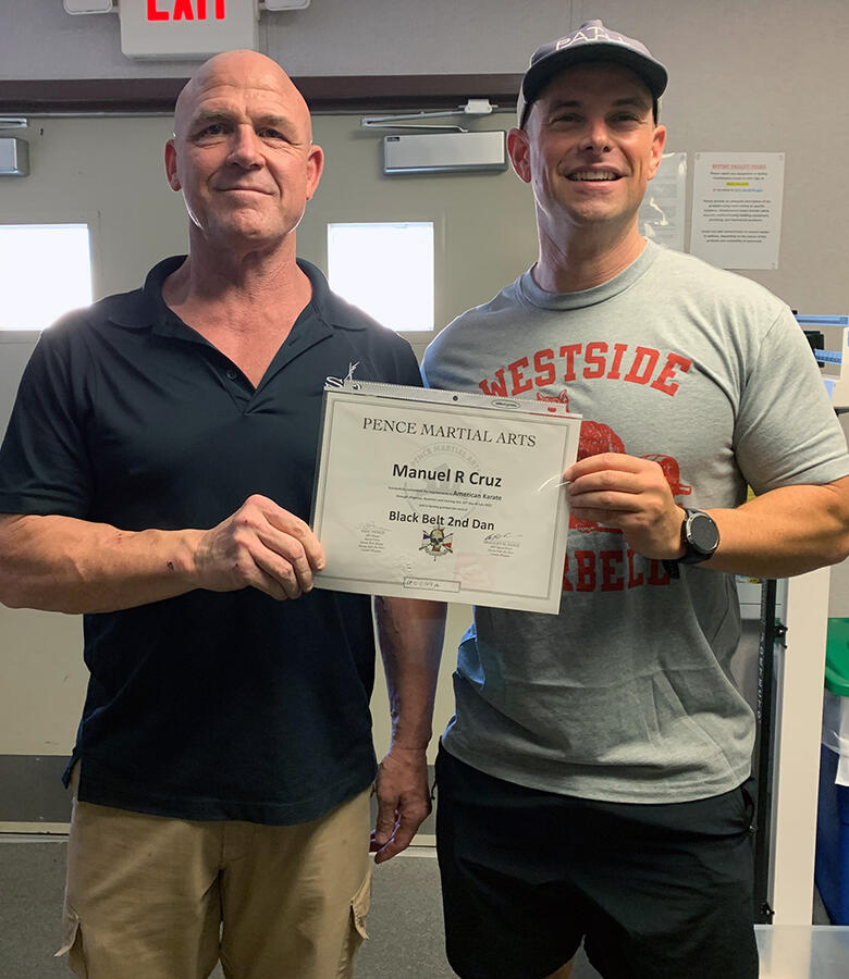 Manuel Cruz recieves his 2nd Dan Black Belt in American Karate