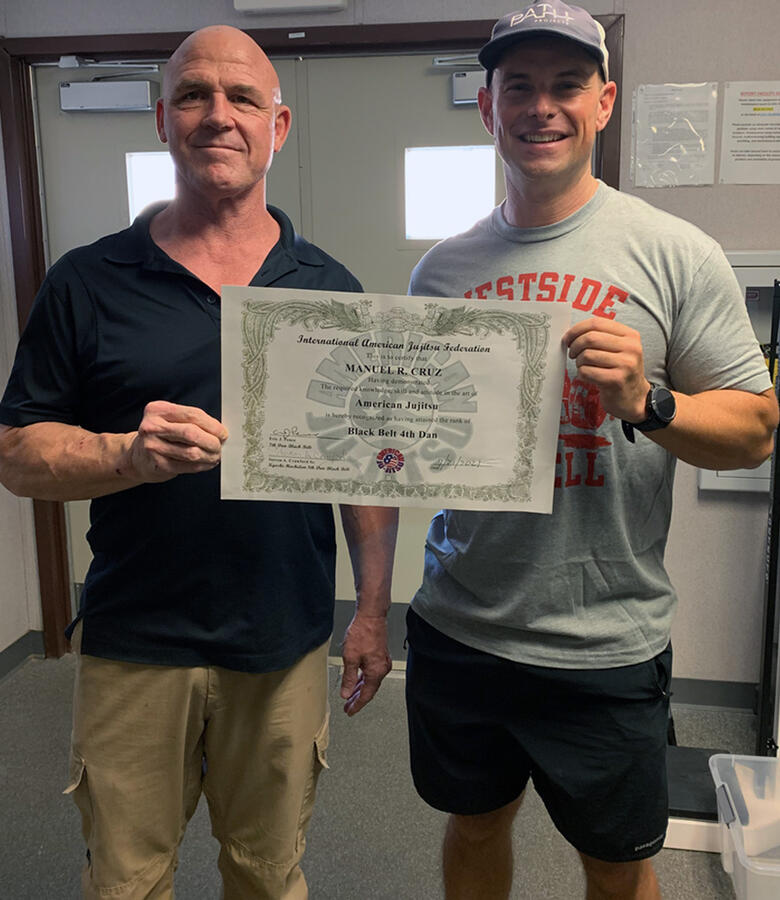 Manuel Cruz recieves his 4th Dan Black Belt in American Jiu-Jitsu